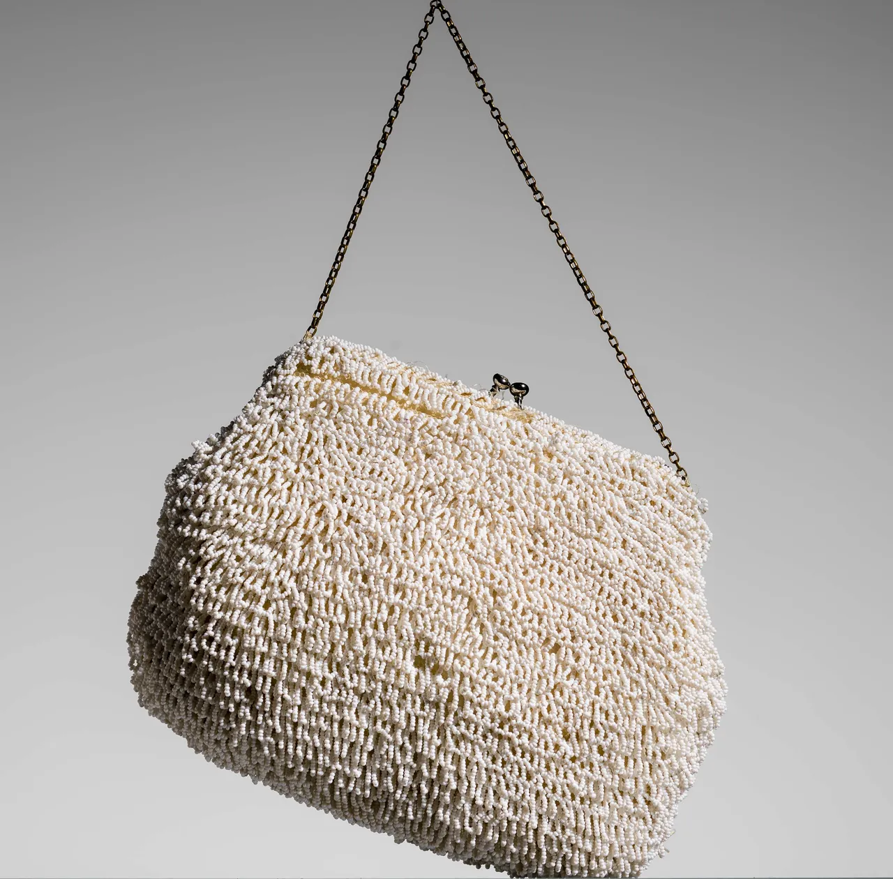 White beaded fringe purse, flapper style, photographed in 2014.